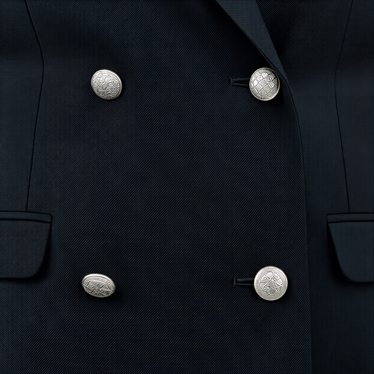 Close-up of a tailored jacket button