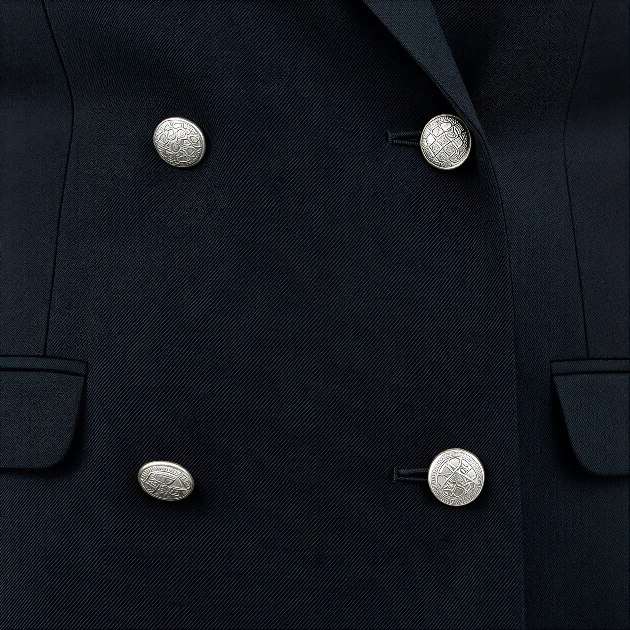 Close-up of a tailored jacket button