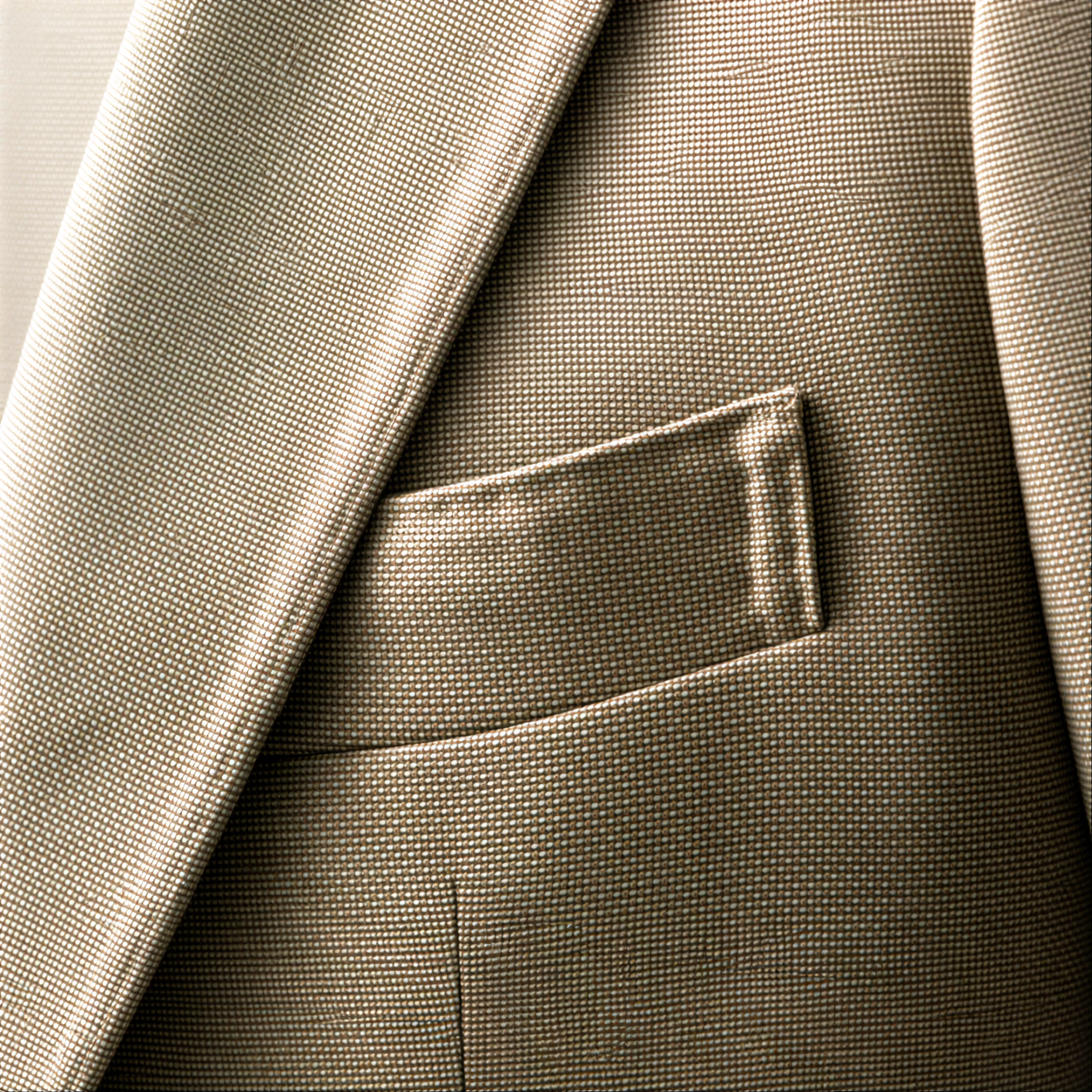 Blue tailored jacket showing lapel and pocket placement